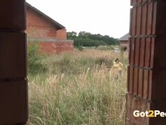 Blonde teen pisses on a building site to relieve pee desperation Thumb