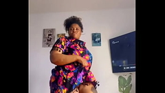 Afro Getty lifts her dress while dancing Thumb