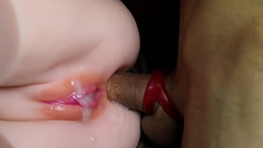 A sexy bald vagina is abundantly filled with fresh sperm and sperm flows over the plump labia close-up Thumb