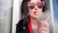 Sexy smoking fetish from Dominatrix Nika. Thumb