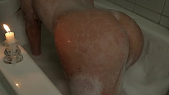 A Slender Beauty Takes a Bath With Foam Caressing  Pussy. Thumb