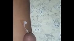 Ugandan teen Jerking off on his birthday,as he shows off his 10 inch black dick in this video Thumb