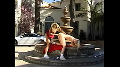 Two sensual blondes with sexy figures give pleasure to each other by licking pussies and using a dildo near the fountain Thumb