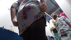 A hidden camera in a fitting room spies on a girl with a gorgeous ass and beautiful legs in pantyhose. Then a voyeur peeks under her skirt in a public store. Amateur foot fetish. Thumb