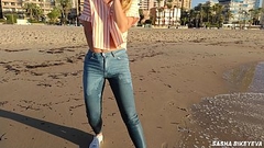 Wet shoot on a public beach with Crazy Model. Risky outdoor masturbation. Foot fetish. Pee in jeans. Thumb